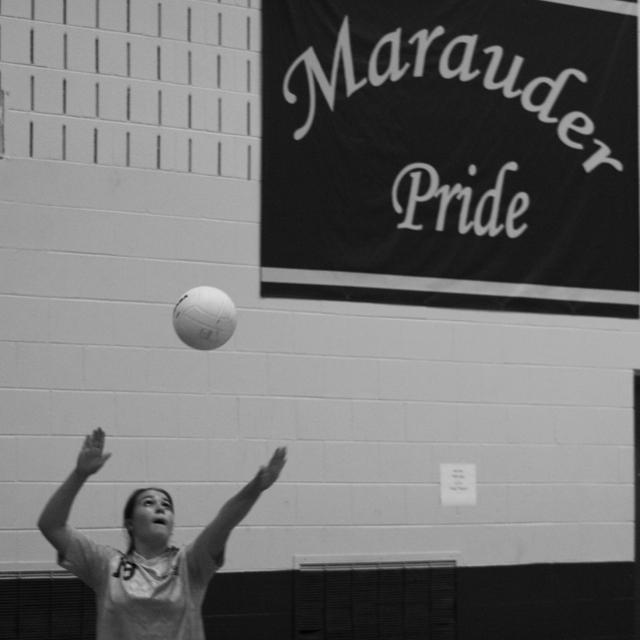 With+the+game+on+the+line%2C+eighth+grade+student+Chloe+Harris+serves+the+ball%2C+clearly+focused+for+an+important+game+in+front+of+her+home+crowd.+As+the+season+continues%2C+the+girls+have+become+close+friends.+They+play+most+Monday+afternoons.+%7C+Photo+by+Sam+Sherwood