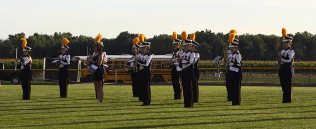 The+marching+band+takes+the+field+and+performs+for+the+crowd%2C+playing+music+of+the+Beatles.+The+band+entered+the+MSUFCU+School+Spirit+Awards+for+marching+bands+and+varsity+cheerleaders.+The+marching+band+won+the+competition+with+approximately+600+votes+over+Brighton%2C+a+district+which+is+five+times+bigger+than+Ovid-Elsie.+The+prizes+include+a+session+with+John+Madden%2C+the+director+of+the+Spartan+Marching+band%3B+a+cash+donation+from+Marshall+Music%3B+transportation+from+Dean+Trailways%3B+and+a+party+at+City+Limits.+%7C+Photo+by+Linn+Benham+