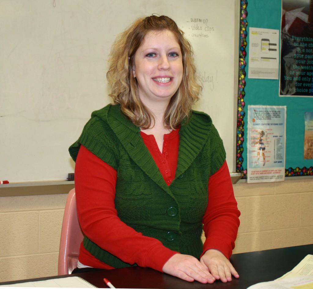 Biology+teacher%2C+Mrs.+McCormick%2C+helps+show+school+spirit+by+dressing+up+for+Wacky+Winter+Week.+This+was+Red+and+green+day.%0Al+Photo+by+Jonah+Workman%0A