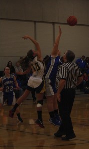 The freshman girls start of their game strong with a jump ball. | Photo by Lindsay Benham