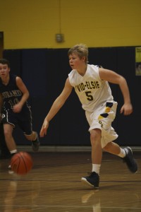Sophomore Brendan Sutliff dribbles down the court going for a Marauder basket. |Photo by: Sabra Francis 