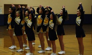 This is the Middle school girls competitive cheer during there half time show supporting the boys basketball. | Photo by Michaela Post