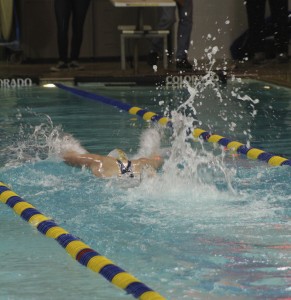 Senior Mackenzie Jacobs races to finish her race. Jacobs was on Homecoming court, and has been swimming for two years. | Photo by Marrissa McOwen