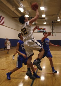 Freshman, Trace Pardee goes for the lay-up. 
