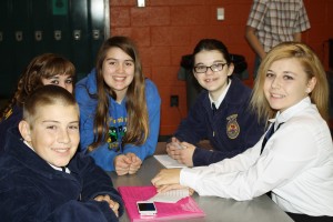 The FFA team works really well together to make Ovid Elsie look great. lPhoto by Maddie Putnam