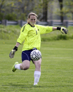 Sophomore Megan Walter kicks the ball to her teammates. | Photo by Linn Benham