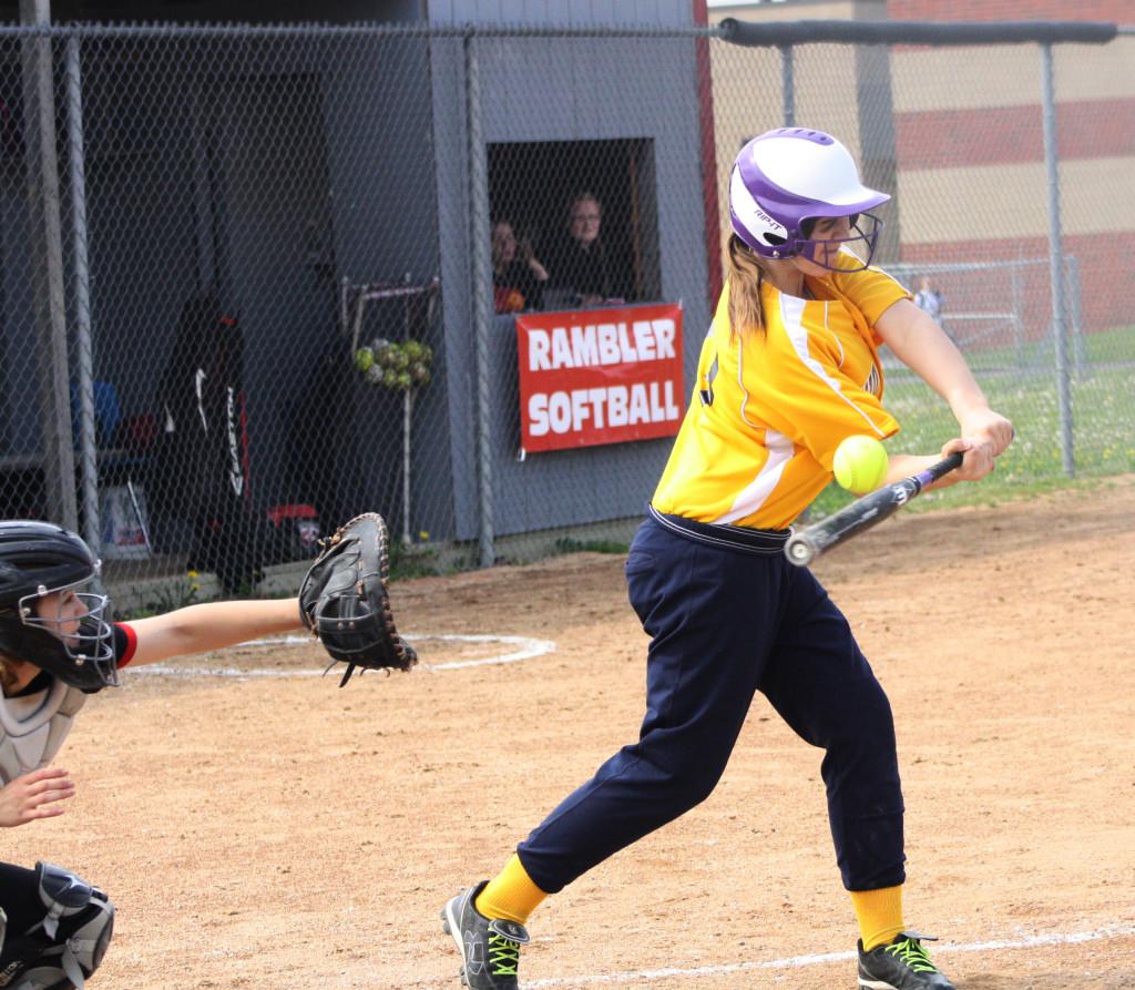 Sophomore+Kari+Fogarty+hit+the+ball+gaining+a+run+for+the+JV+girls+against+Perry.+%7CPhoto+by+Michaela+Post