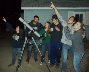 Mr. Martin and a group of future astronomers take a close-up look at the stars, planets and moon.  | Photo courteousy of Michelle Martin