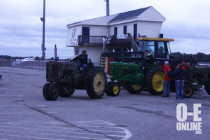 FFA drive your tractor to school day. Billy Ockerman has to pull start Aaron Holton. |Photo by: Hannah Davis