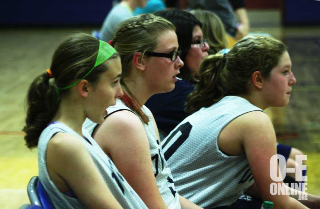 7th+grade+O-E+basketball+players+resting+after+a+quick+warmup+before+their+game.+They+cheer+there+teammates+on+and+showed+greats+sportsmanship.+%7CPhoto+by+A.J+Larsen