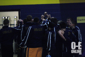 The middle school wrestling team huddles before their meet. |Photo by Molly Maynard