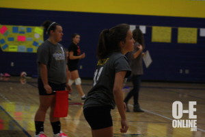 The Middle school volleyball girls getting ready for the other team. |Photo by Mikayla Baese 