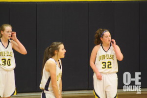 3 of the JV basketball girls catching a breath getting ready to go back out and win the game.|Photo by Mikayla Baese