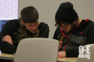 Juniors Clayton Alaga(left) and Kyle Wending(right) concentrate on their competition questions for Science Olympiad. | Photo by Molly Maynard