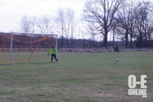 Varsity goalie Megan Walter watches the ball come towards her. |Photo by Rebecca McClure.