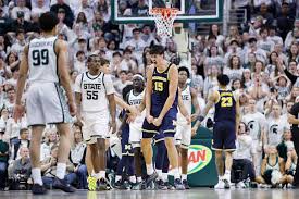Wolverines beat Spartans 83-71 at Breslin